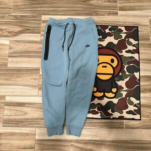Blue Nike Tech Fleece joggers